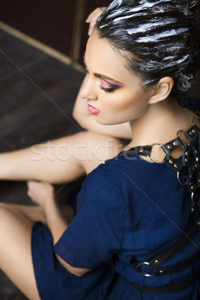 Beautiful young brunette woman with fantasy makeup and hair dres Stock photo © dashapetrenko