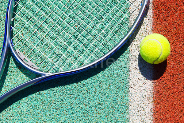 Close up of tennis racquet and ball  Stock photo © dashapetrenko