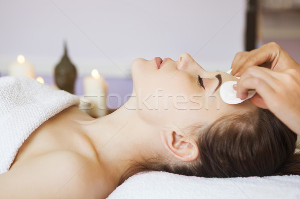 Relaxed woman with a deep cleansing nourishing face mask applied Stock photo © dashapetrenko