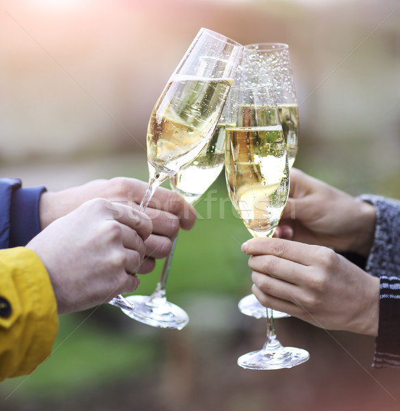  Party with sparkling champagne glasses outdoors Stock photo © dashapetrenko