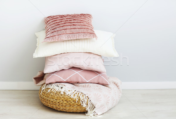 Pink and white pillows on the wall background Stock photo © dashapetrenko