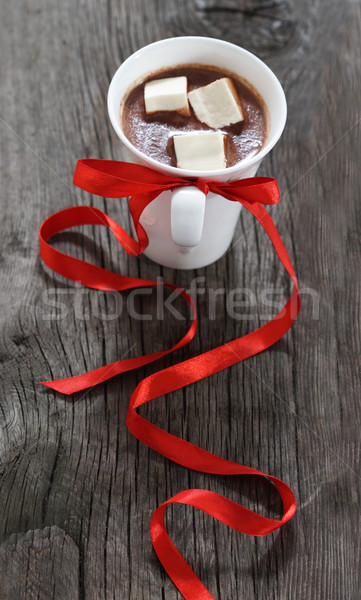 Forró csokoládé bögre díszített vörös szalag fa háttér Stock fotó © dashapetrenko