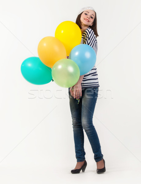 Young cute brunette girl in parisian style with ballons Stock photo © dashapetrenko