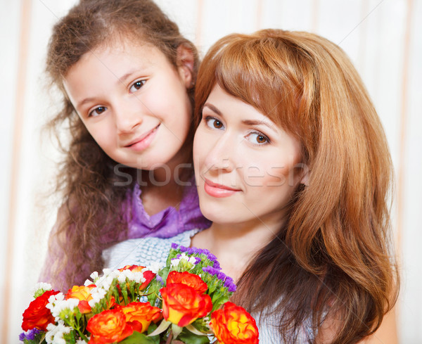 Portrait of happy mother and her little daughter Stock photo © dashapetrenko