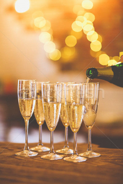 Champagne glasses on gold background. Party concept Stock photo © dashapetrenko