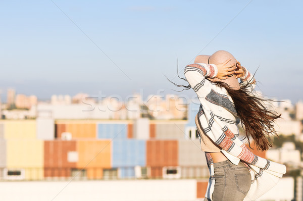 Young woman outdoors on city background in sunny day Stock photo © dashapetrenko