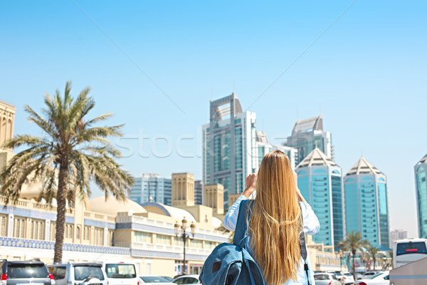 Woman taking mobile photo of the Central Souq in Sharjah City, U Stock photo © dashapetrenko