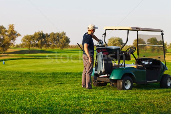 Athletic young man playing golf Stock photo © dashapetrenko