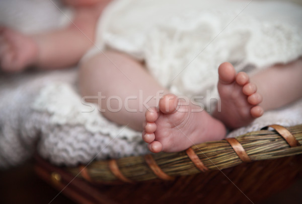 Stock photo: Close up of tiny baby feet. Toes. Horizontal photo. Macro. 