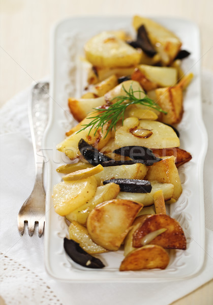 Potato salad with olives, onion, dill and olive oil Stock photo © dashapetrenko