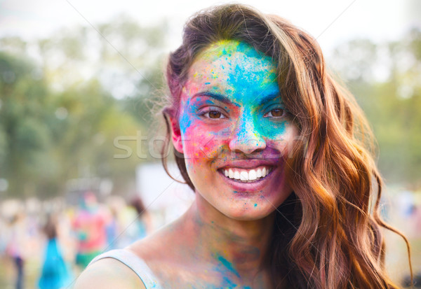 Happy young girl on holi color festival Stock photo © dashapetrenko