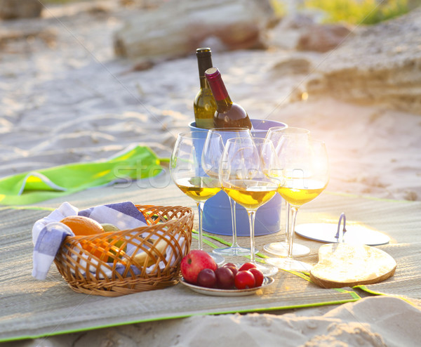 Glasses of the white wine on the beach picnic Stock photo © dashapetrenko