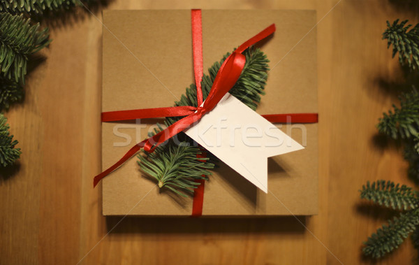 Christmas gift laid on a wooden table background Stock photo © dashapetrenko
