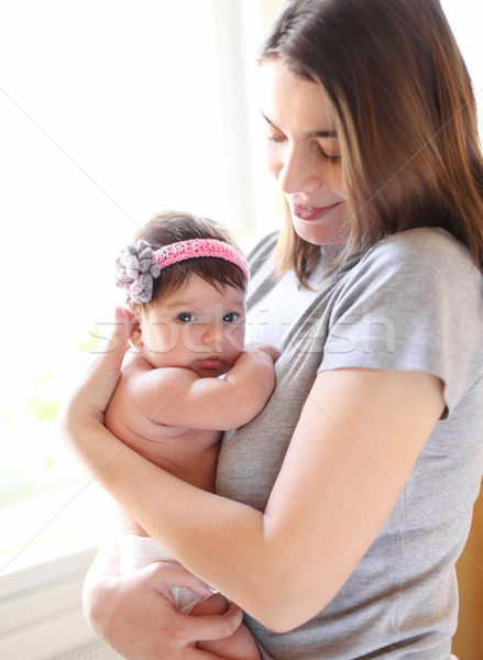 Szczęśliwy uśmiechnięty matka baby jeden miesiąc Zdjęcia stock © dashapetrenko