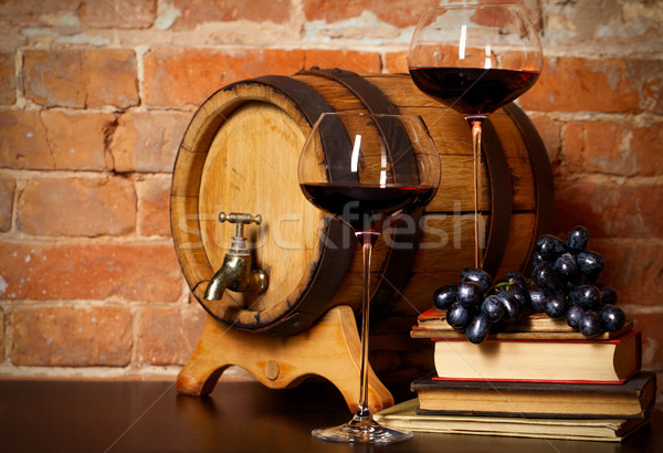 Retro still life with red wine and barrel Stock photo © dashapetrenko