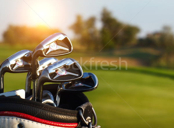 Palos de golf verde campo verano puesta de sol deporte Foto stock © dashapetrenko