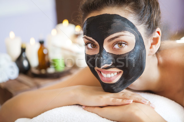 Young beautiful woman in a mask for the face of the therapeutic  Stock photo © dashapetrenko
