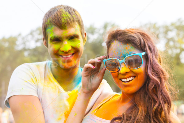 Portrait of happy couple on holi color festival Stock photo © dashapetrenko