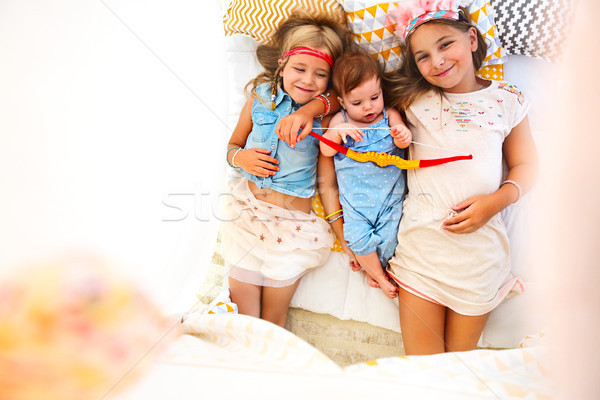 Three cute girl playing together Stock photo © dashapetrenko