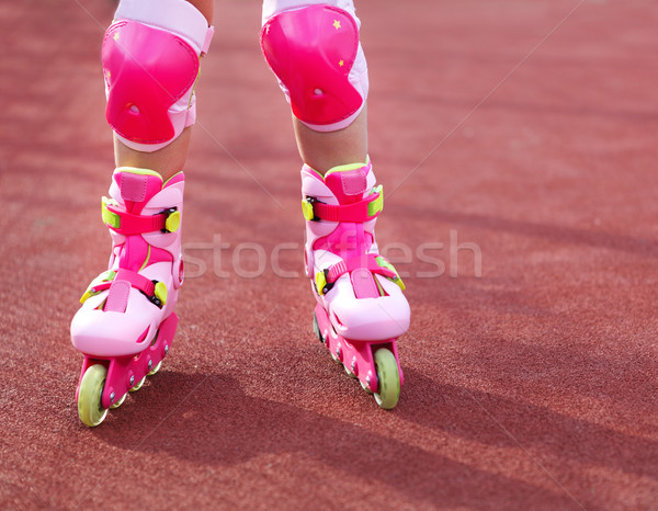 Rollerblades inline skates of a child closeup in action outdoors Stock photo © dashapetrenko