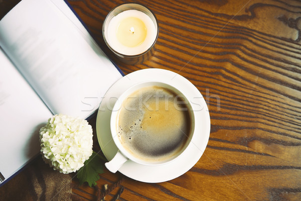Coffee, book, plaid and candle at home Stock photo © dashapetrenko