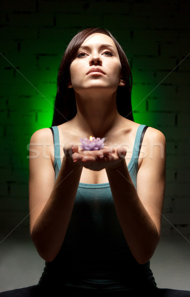 Stock photo: Attractive young woman doing yoga 