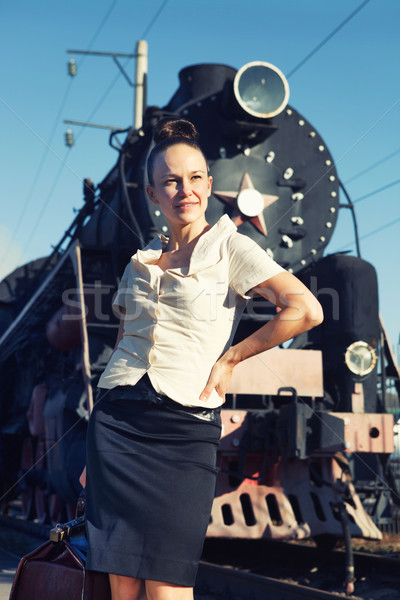 Woman standing on the platform near the retro train Stock photo © dashapetrenko