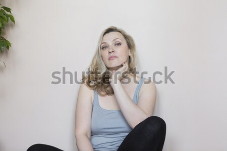 Portrait of middle age woman in the room Stock photo © dashapetrenko