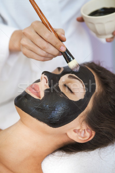 Young beautiful woman in a mask for the face of the therapeutic  Stock photo © dashapetrenko