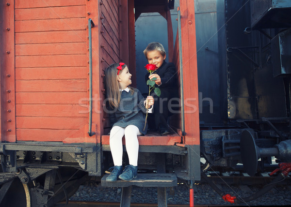 little boy and the little girl in the retro train Stock photo © dashapetrenko