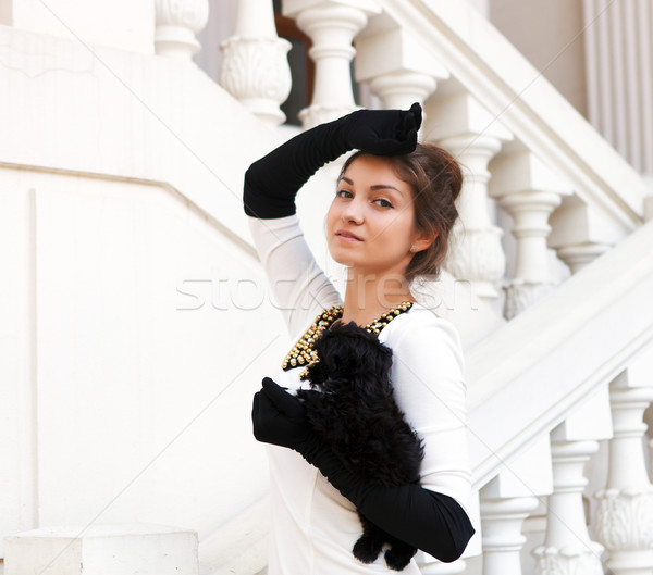 Young brunette woman hugging her lap dog puppy Stock photo © dashapetrenko