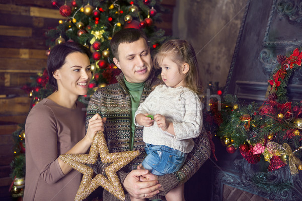 Stock fotó: Karácsony · családi · portré · otthon · ünnep · nappali · díszített