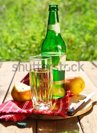 Pear cider and one pear  Stock photo © dashapetrenko