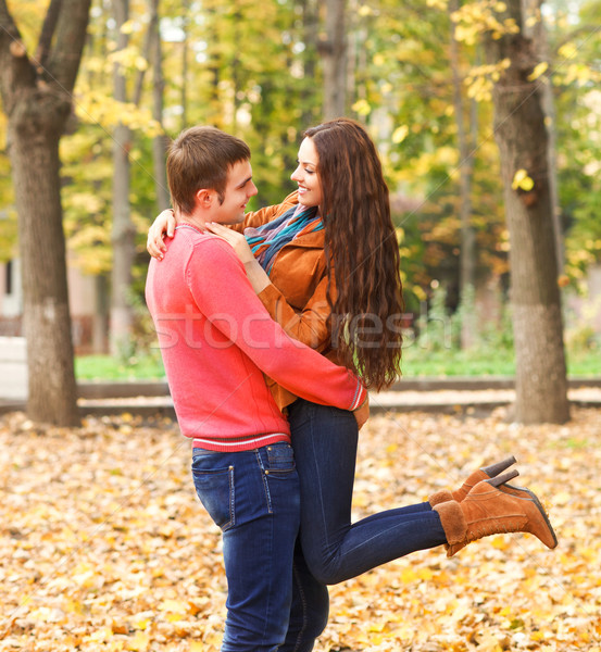 Portrait of happy couple enjoying golden autumn Stock photo © dashapetrenko