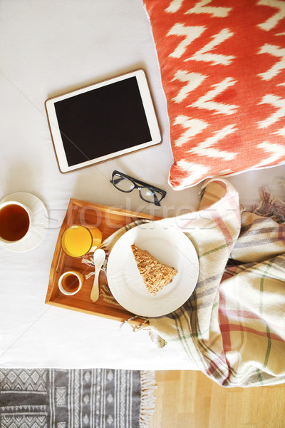 Cozy breakfast in bed with tea  Stock photo © dashapetrenko