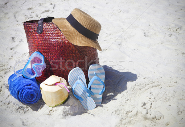 Straw hat, wather mask, beach towel, flip flops with beach bag a Stock photo © dashapetrenko