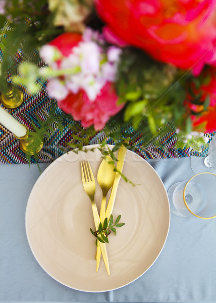 Table setting in vintage style is decorated with flowers  Stock photo © dashapetrenko