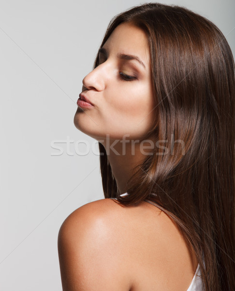 Portre genç gülen kız gri el Stok fotoğraf © dashapetrenko