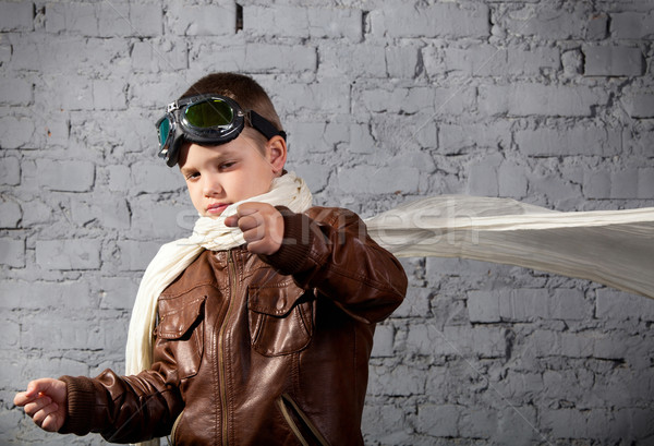 Kicsi fiú álmodik pilóta retró stílus egyenruha Stock fotó © dashapetrenko