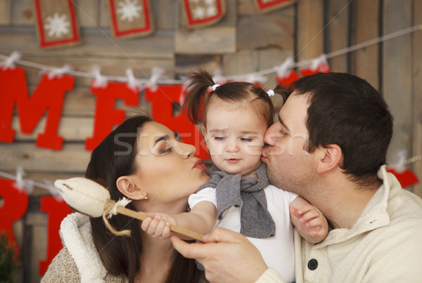 Happy smiling family with one year daughter Stock photo © dashapetrenko