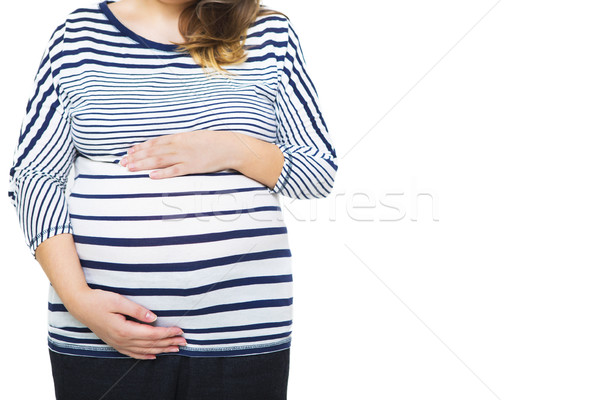 Happy young pregnant woman in blue and white clothes in marine s Stock photo © dashapetrenko
