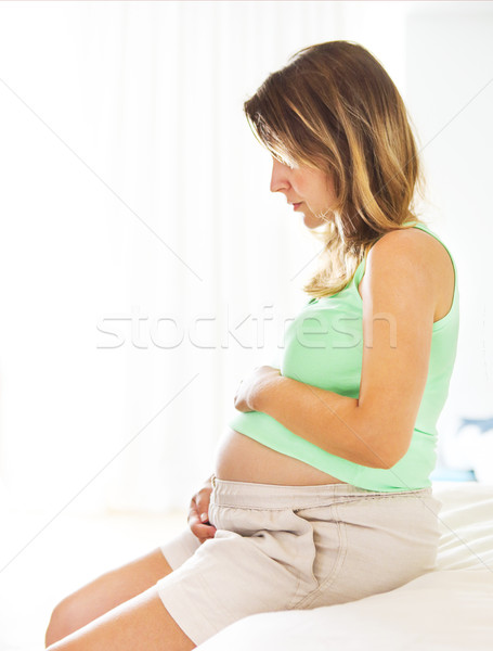 Happy pregnant woman indoors  Stock photo © dashapetrenko