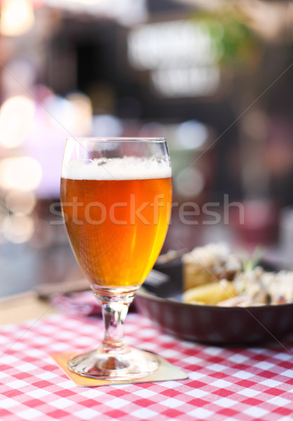 Egy üveg világos sör saláta kocsma étel Stock fotó © dashapetrenko