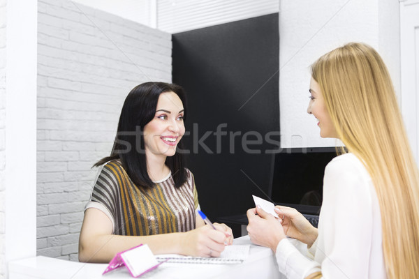 Beautician talking with client at the beauty salon  Stock photo © dashapetrenko