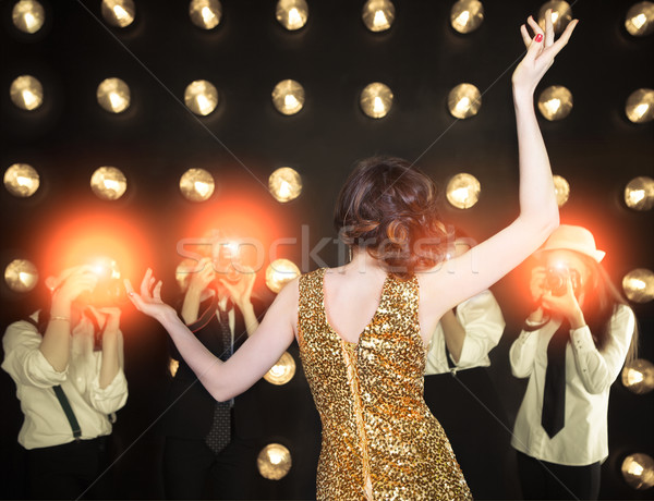 Superstar kadın poz paparazzi altın Stok fotoğraf © dashapetrenko