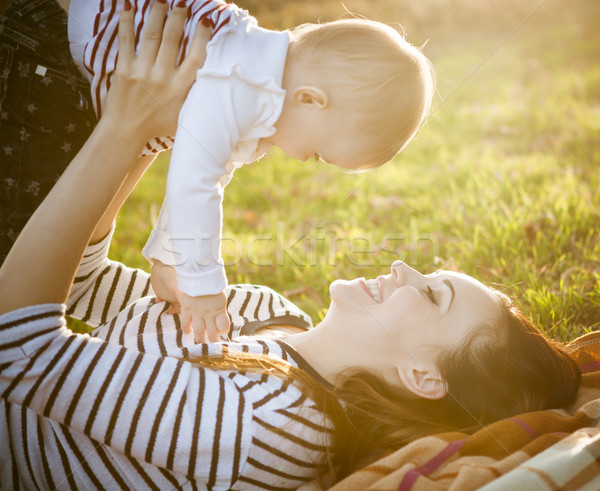 Mother with her baby daughter in autumn park Stock photo © dashapetrenko
