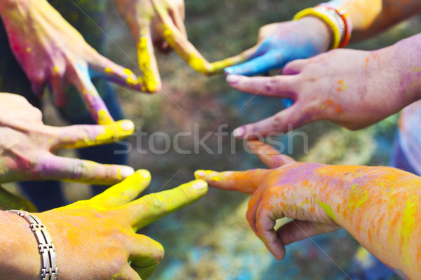 Friends putting their hands together in a sign of unity and team Stock photo © dashapetrenko
