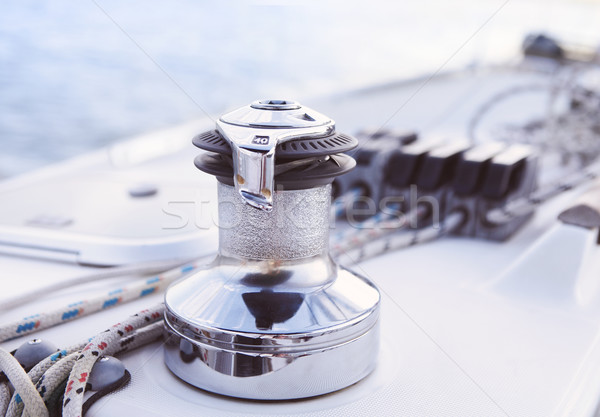 Sailboat detailed parts. Close up on winch and rope of yacht ove Stock photo © dashapetrenko