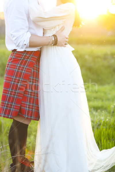 Jóvenes feliz Pareja junto mano puesta de sol Foto stock © dashapetrenko