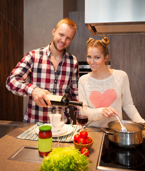 Happy couple cooking pasta  Stock photo © dashapetrenko